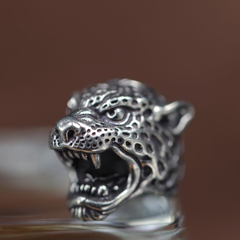 Escultura de cabeza de leopard - Paracord Survival Bracelet reseña y precio