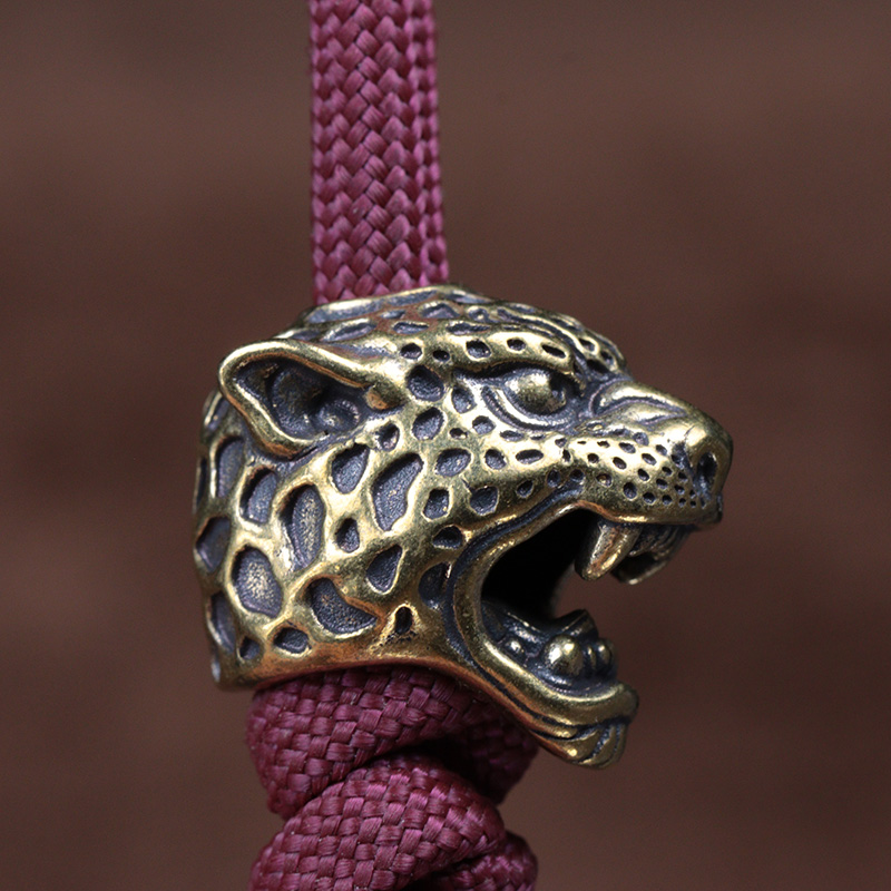Escultura de cabeza de leopard - Paracord Survival Bracelet reseña y precio