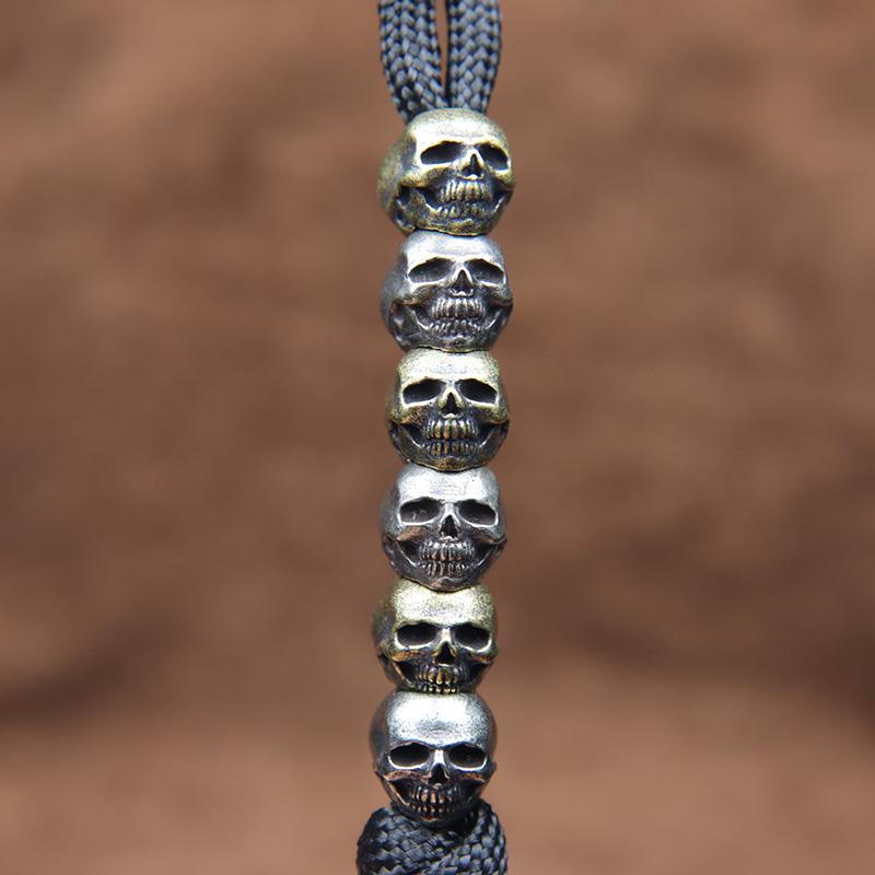 Mini cabeza de calavera, cuent - Paracord Survival Bracelet reseña y precio