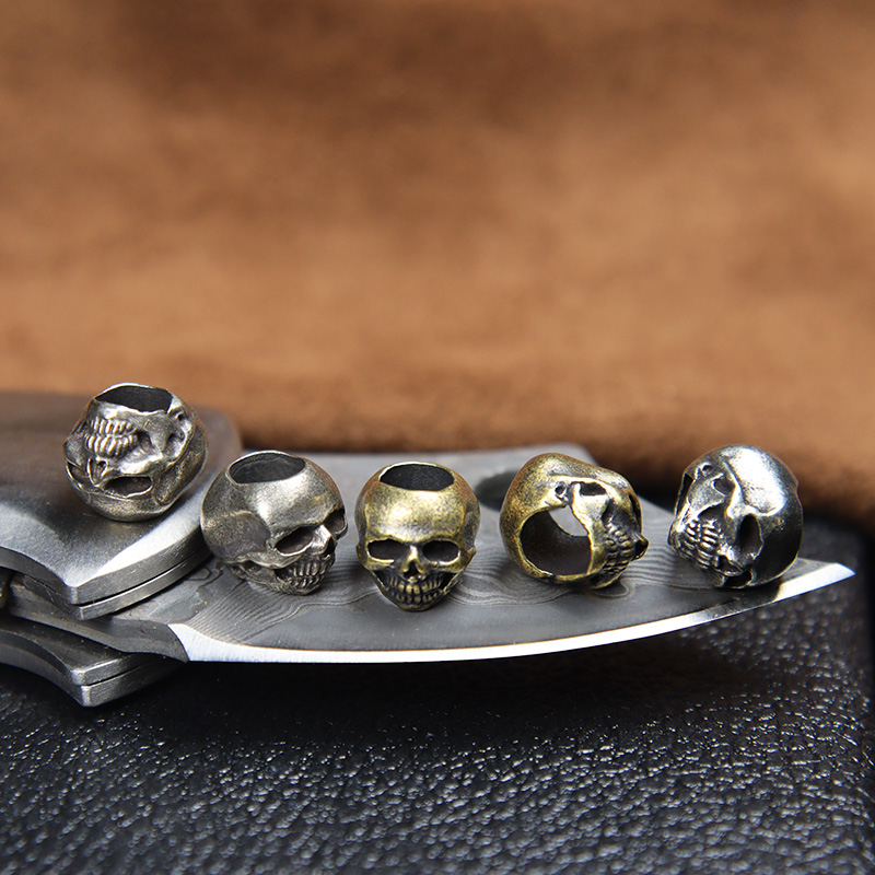 Mini cabeza de calavera, cuent - Paracord Survival Bracelet reseña y precio